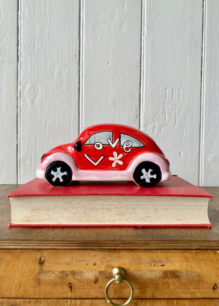 A Volkswagon Beetle ceramic money bank