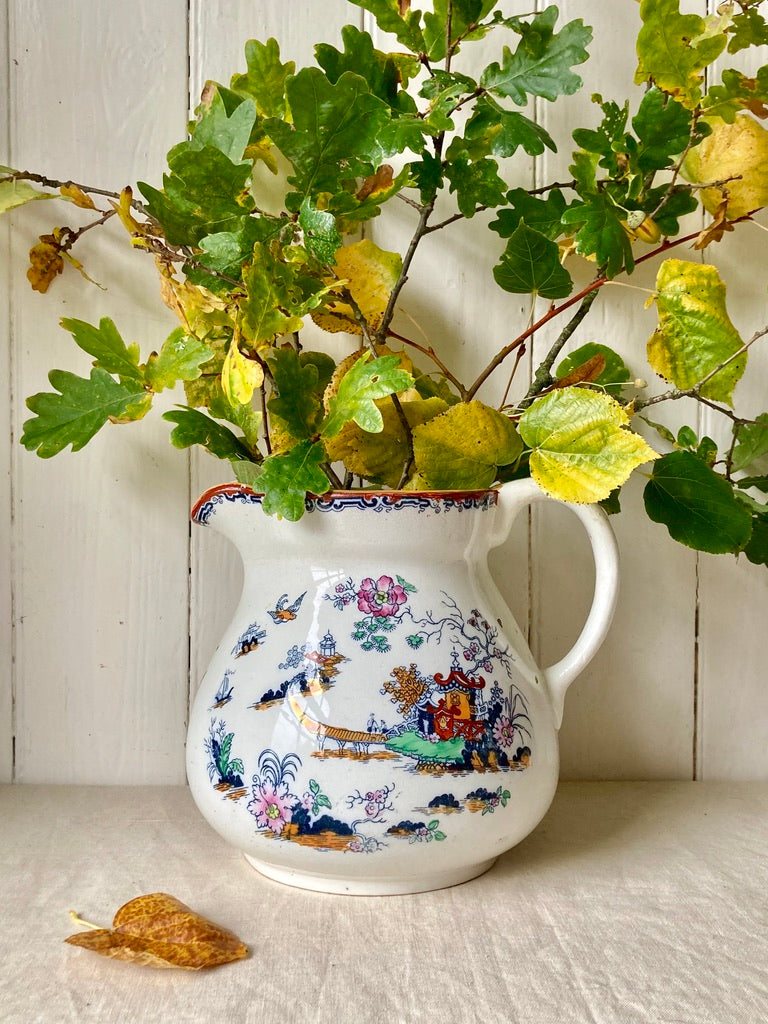 Extra large decorative jug with oriental style pattern and detailing