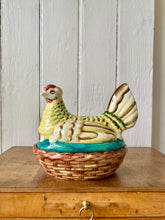 Load image into Gallery viewer, A decorative hand painted chicken egg tidy, sitting on her nest
