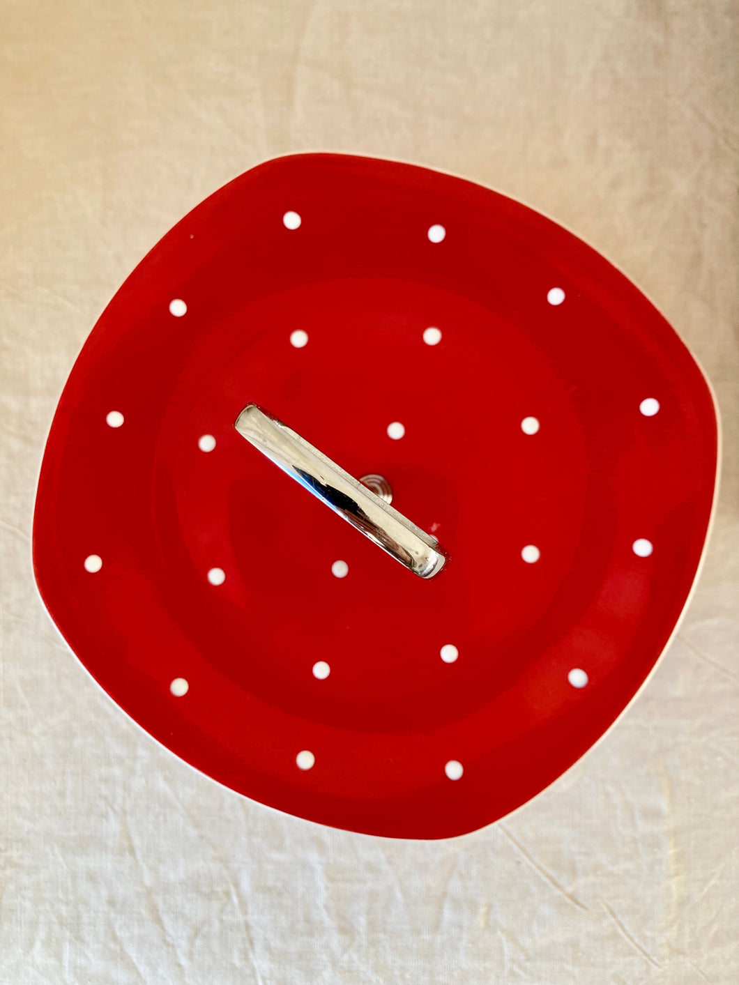 Two-tier red polka dot cake stand