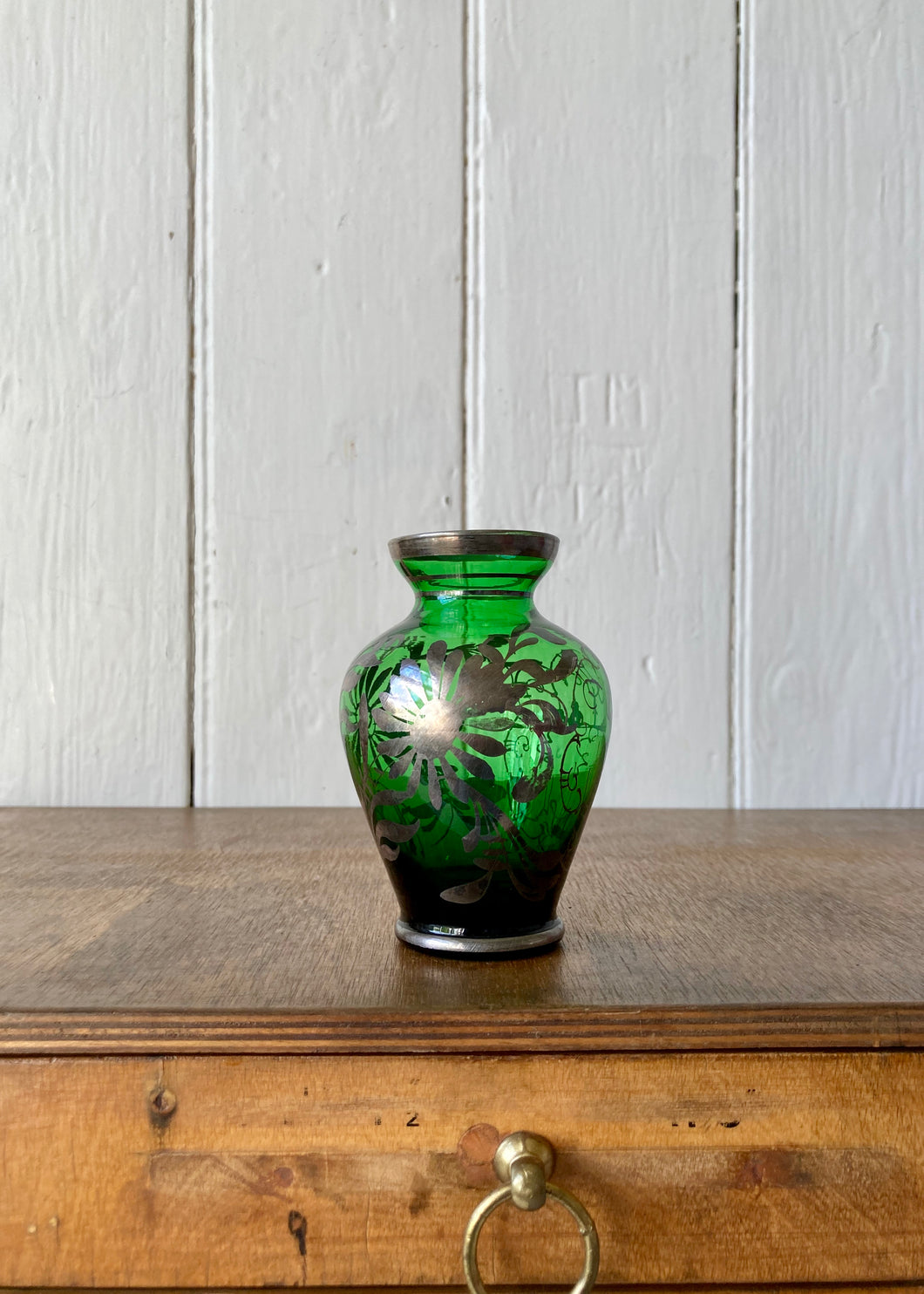 Small hand blown green glass vase